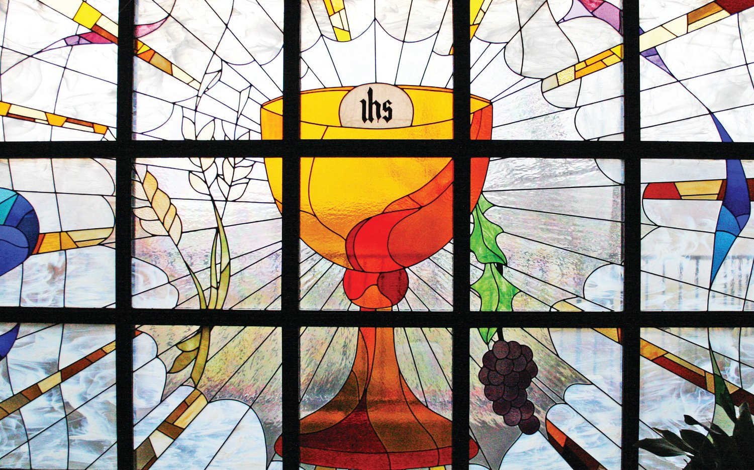 This magnificent art-glass window in St. Anthony Church in Camdenton depicts the Eucharist as the source and summit of the Christian life and the focal point of Christian community.